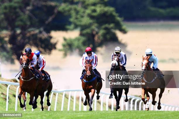 The runners and riders race in The Go Racing With Vickers.bet Apprentice Handicap Stakes at Chepstow Racecourse on July 14, 2022 in Chepstow, Wales.