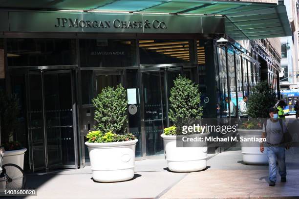 Person walks past the JP Morgan Chase headquarters building on Madison Avenue on July 14, 2022 in New York City. JPMorgan Chase announced on Thursday...