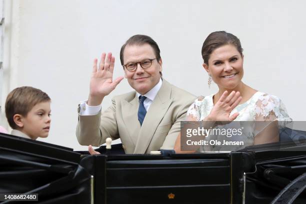 Prince Oscar of Sweden, Prince Daniel of Sweden and Crown Princess Victoria of Sweden leave for a procession through the town in a horse carriage to...