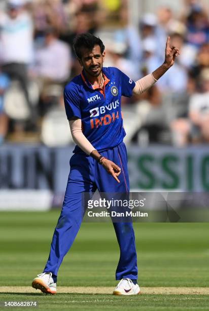 Yuzvendra Chahal of India celebrates taking the wicket of Moeen Ali of England during the 2nd Royal London Series One Day International between...