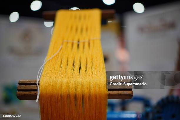 golden color silk threads - gold embroidery stock pictures, royalty-free photos & images