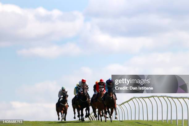 The runners and riders race in The Follow Vickers.bet On Facebook/Twitter Handicap Handicap Stakes at Chepstow Racecourse on July 14, 2022 in...