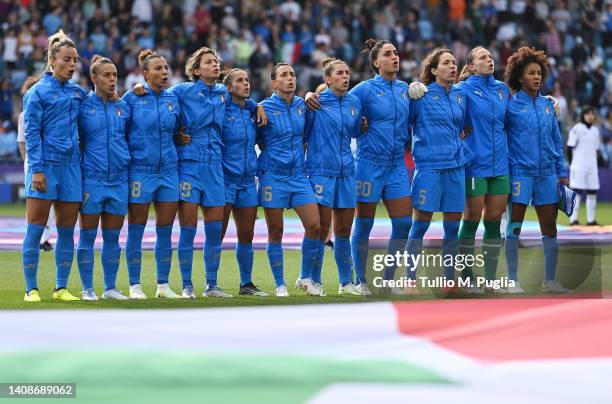 Italy players sing their national anthem prior to the UEFA Women's Euro 2022 group D match between Italy and Iceland at Manchester City Academy...