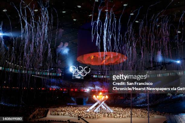 Streamers fall to the floor of BC Place stadium during the Closing Ceremonies of the Winter Olympic Games in Vancouver, British Columbia, on Sunday,...