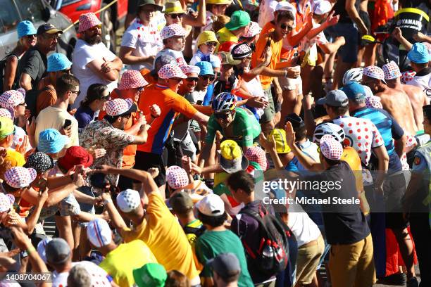 Detailed view of Wout Van Aert of Belgium and Team Jumbo - Visma Green Points Jersey competes passing through The Dutch corner climbing to the L'Alpe...