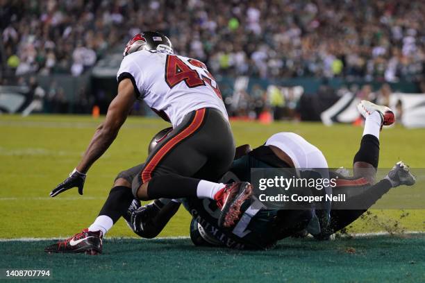 Jalen Reagor of the Philadelphia Eagles collides with Ross Cockrell of the Tampa Bay Buccaneers during a NFL game at Lincoln Financial Field on...