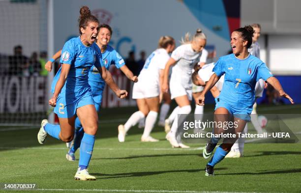 Valentina Bergamaschi celebrates with Flaminia Simonetti of Italy after scoring their team's first goal during the UEFA Women's Euro 2022 group D...
