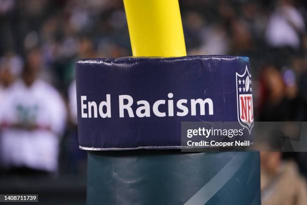 Close up view of End Racism signage prior to a NFL game between the Philadelphia Eagles and the Tampa Bay Buccaneers at Lincoln Financial Field on...