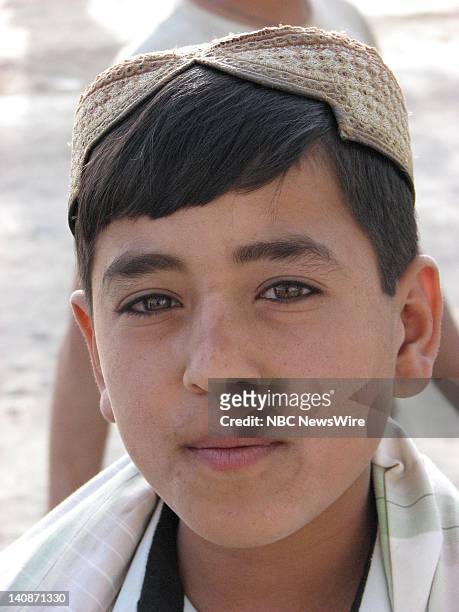 Afghanistan -- Pictured: A boy in traditional headdress in Moqur, Afghanistan in September 2006 -- Photo by: Paul Nassar/NBC NewsWire
