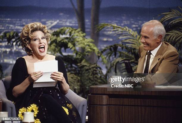 Episode -- Pictured: Actress/singer Bette Midler during an interview with and host Johnny Carson on May 21, 1992 -- Photo by: Alice S. Hall/NBCU...