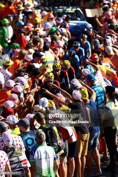 Detailed view of Dylan Van Baarle of Netherlands and Team INEOS Grenadiers with teammates passing through The Dutch corner climbing to the L'Alpe...