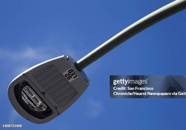 An energy-saving LED street light is installed on a lamp post at 98th Avenue and MacArthur Boulevard in Oakland, Calif. On Tuesday, June 18, 2013....