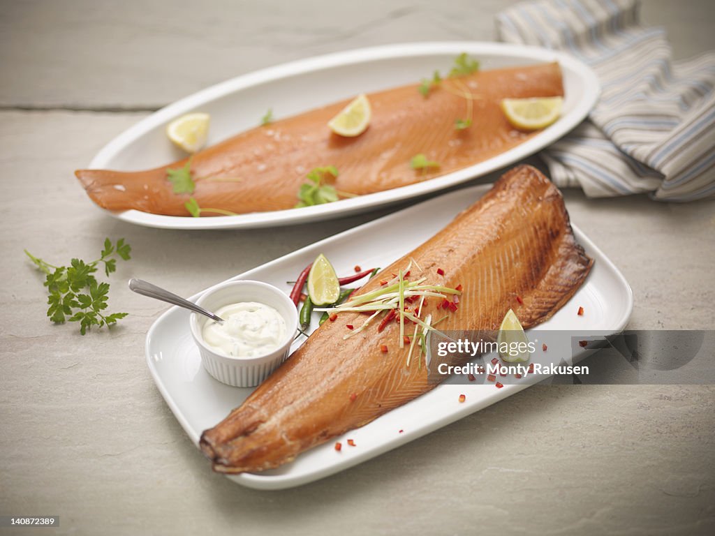 Plates of hot-smoked and cold-smoked hand-reared Scottish salmon fillets