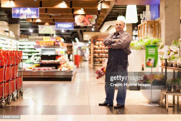 clerk standing in grocery store - western cape province stock pictures, royalty-free photos & images