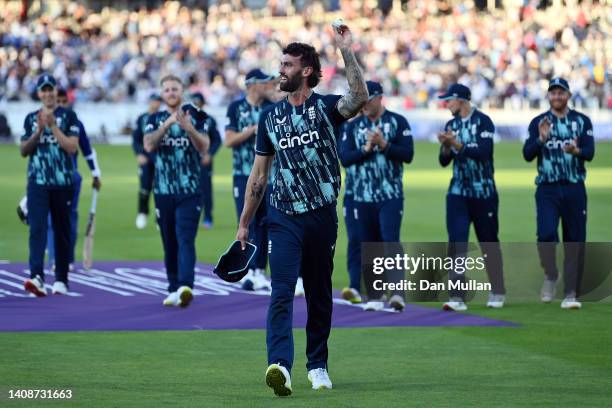 Reece Topley of England leads the England team off the field after claiming 6 wickets during the 2nd Royal London Series One Day International...