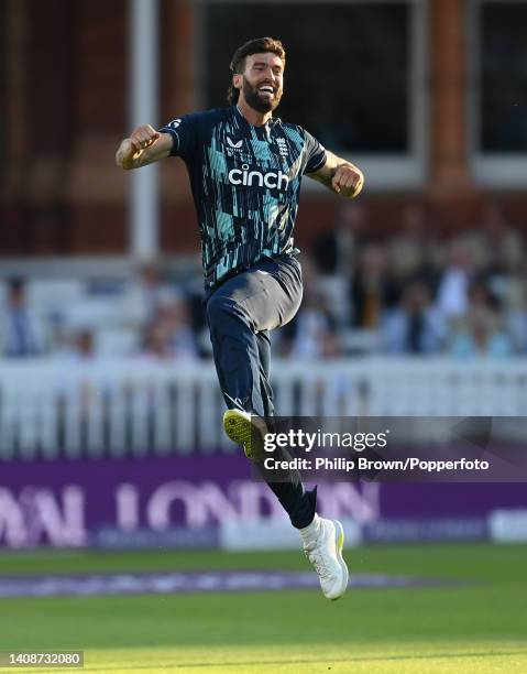 Reece Topley of England celebrates after bowling Yuzvendra Chahal of India during the second Royal London ODI at Lord's Cricket Ground on July 14,...