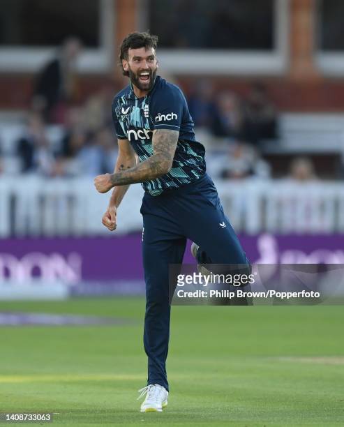 Reece Topley of England celebrates after dismissing Prasdidh Krishna of India during the second Royal London ODI at Lord's Cricket Ground on July 14,...