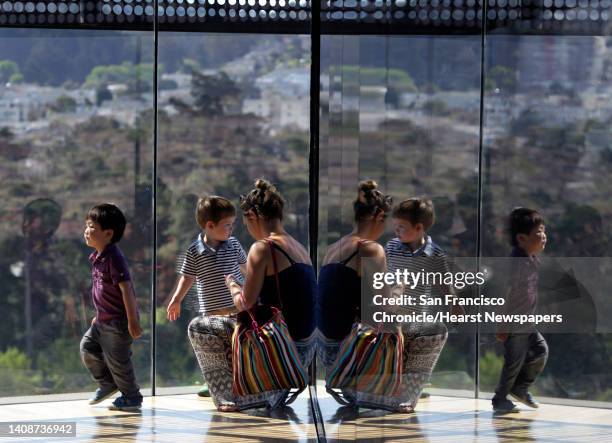 Natasha Michel and young children admires the view from the Hamon Observation Tower at the de Young Museum in San Francisco, Calif. On Wednesday,...