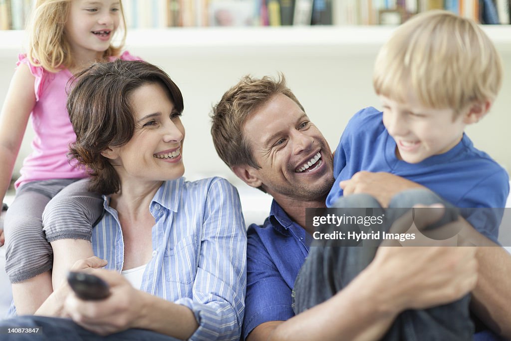 Family relaxing together on couch