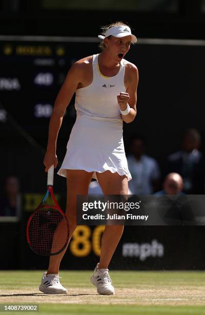 Elena Rybakina of Kazakhstan celebrates against Ons Jabeur of Tunisia during the Ladies' Singles Final match on day thirteen of The Championships...