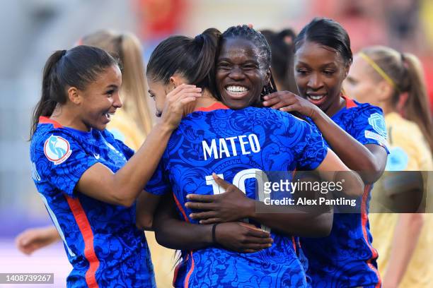 Griedge Mbock Bathy celebrates with Clara Mateo and Grace Geyoro of France after scoring their team's second goal during the UEFA Women's Euro 2022...