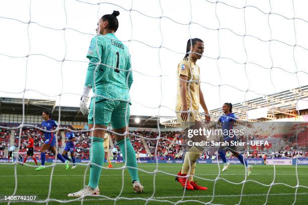 Clara Mateo and Sakina Karchaoui celebrate after teammate Kadidiatou Diani of France scored their sides first goal as Nicky Evrard and Laura De Neve...