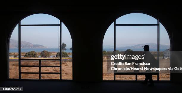 Woman views the construction work on the Presidio Tunnel Tops landscaping project from the Observation Post at the Presidio in San Francisco, Calif....