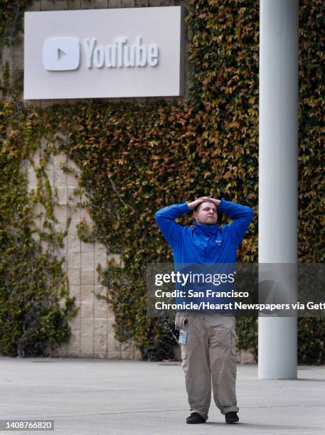 Security guard stands at the main entrance to YouTube headquarters in San Bruno, Calif. On Wednesday, April 4, 2018. On Tuesday, disgruntled video...