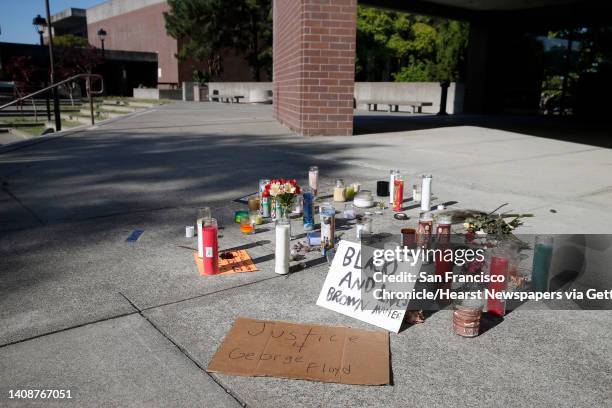 Small memorial shrine is arranged in front of City Hall which remains closed in Vallejo, Calif. On Wednesday, June 3, 2020. National Guard troops...