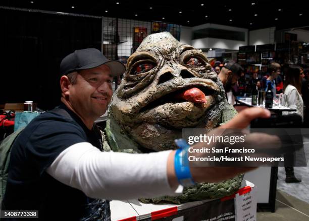 Anthony Gonzales snaps a selfie with Jabba the Hut at the Silicon Valley Comic Con in San Jose, Calif. On Saturday, April 7, 2018.