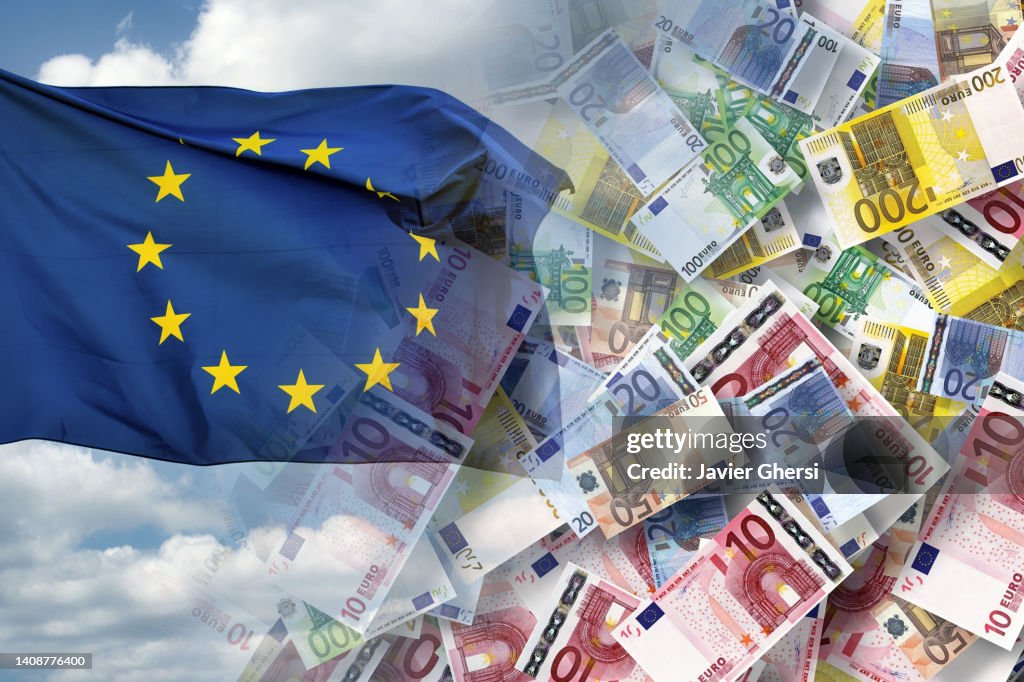 European Union flag and cash euro banknotes