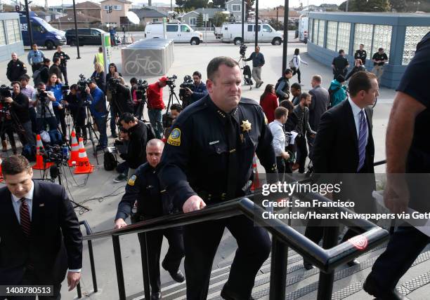 San Bruno Police Chief Ed Barberini leaves a news conference at police headquarters after updating reporters on Monday’s shooting at YouTube offices...