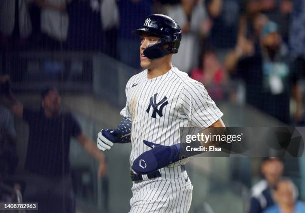 Aaron Judge of the New York Yankees celebrates after he scored in the sixth inning against the Cincinnati Reds at Yankee Stadium on July 14, 2022 in...