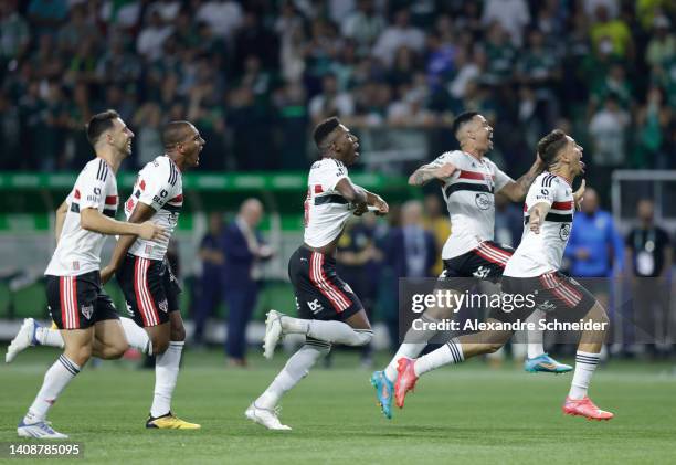 Players of Sao Paulo celebrate after winning the penalty shootout after a match between Palmeiras and Sao Paulo as part of Copa do Brasil 2022 at...