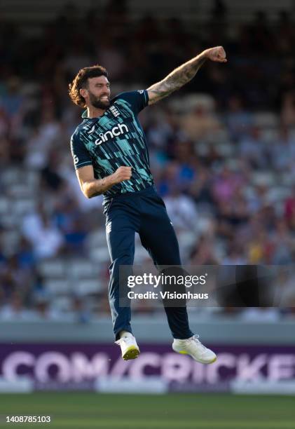 Reece Topley of England celebrates taking the wicket of Yuzvendra Chahal of India during the 2nd Royal London Series One Day International between...