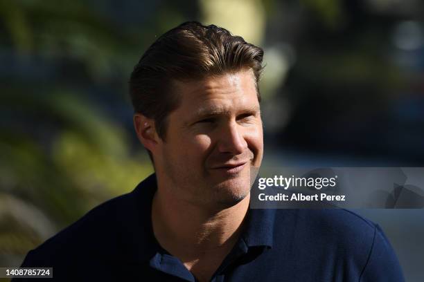 Shane Watson speaks to the media during the ICC Men's T20 Cricket World Cup Trophy Tour at Howard Smith Wharves on July 15, 2022 in Brisbane,...