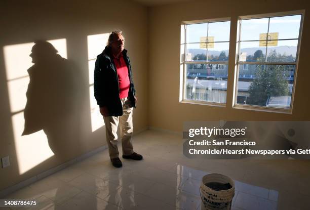 Developer Athan Magganas inspects one of the apartments in his 41-unit building that is nearing completion in Oakland, Calif. On Friday, Oct. 26,...