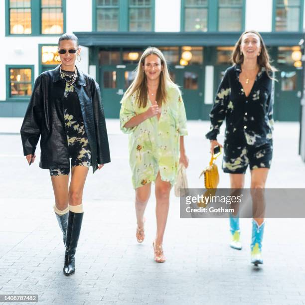 Bella Hadid, Emily Perlstein and Alana Hadid are seen in the South Street Seaport on July 14, 2022 in New York City.