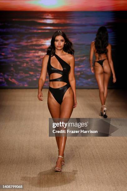 Model walks the runway for Abyss By Abby 2023 Collection during Paraiso Miami Beach at The Paraiso Tent on July 14, 2022 in Miami Beach, Florida.