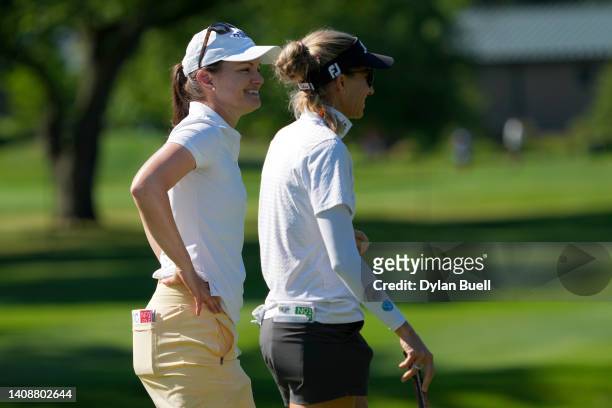 Cindy LaCrosse of the United States and Kris Tamulis of the United States look on from the fifth green during the second round of the Dow Great Lakes...