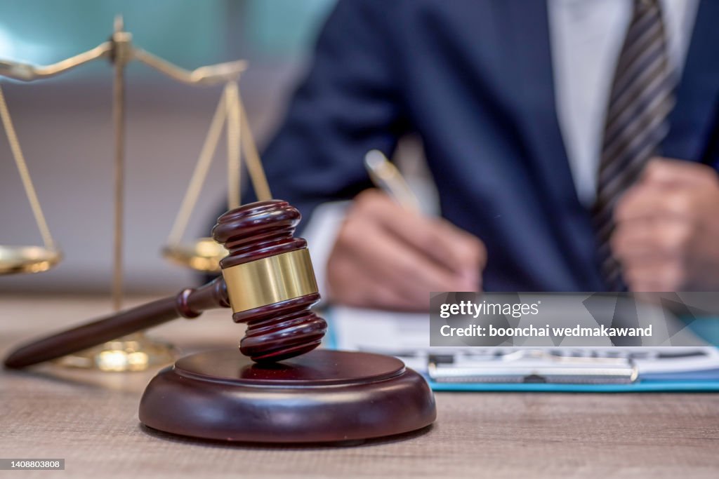 Judge gavel with justice lawyers.