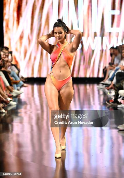 Model walks the runway wearing Intenza Swimwear at Miami Swim Week powered by Art Hearts Fashion at Faena Forum on July 14, 2022 in Miami Beach,...