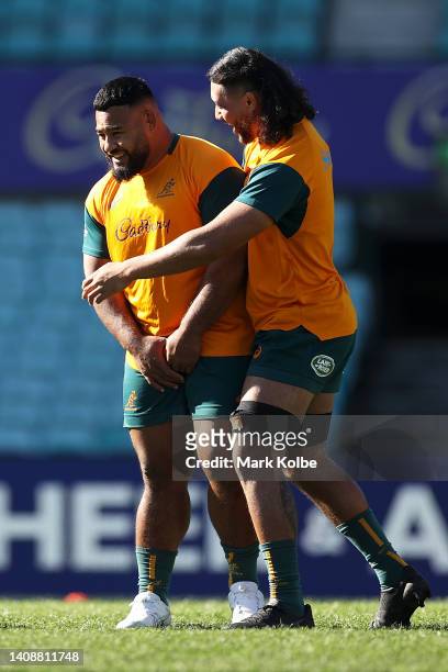 Taniela Tupou and Rob Leota share a laugh during the Australia Wallabies Captain's Run at Sydney Cricket Ground on July 15, 2022 in Sydney, Australia.