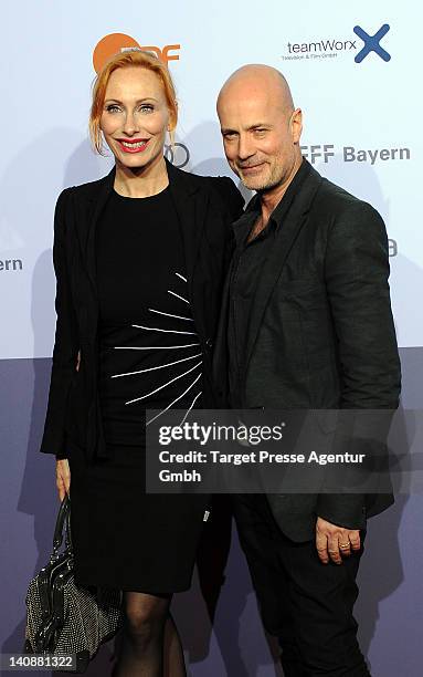Christian Berkel and his wife Andrea Sawatzki attend the premiere of 'Muenchen 72- Das Attentat' at Astor Film Lounge on March 7, 2012 in Berlin,...