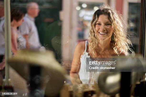 happy woman window shopping. - rovinj stock pictures, royalty-free photos & images