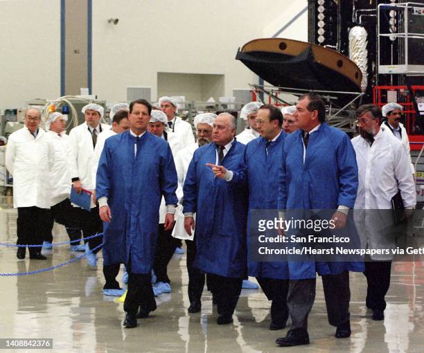 Vice President Al Gore and Russian Prime Minister Viktor Chernomyrdin, on Gore's left, are given a tour of the clean room at Lockheed Martin Missile...