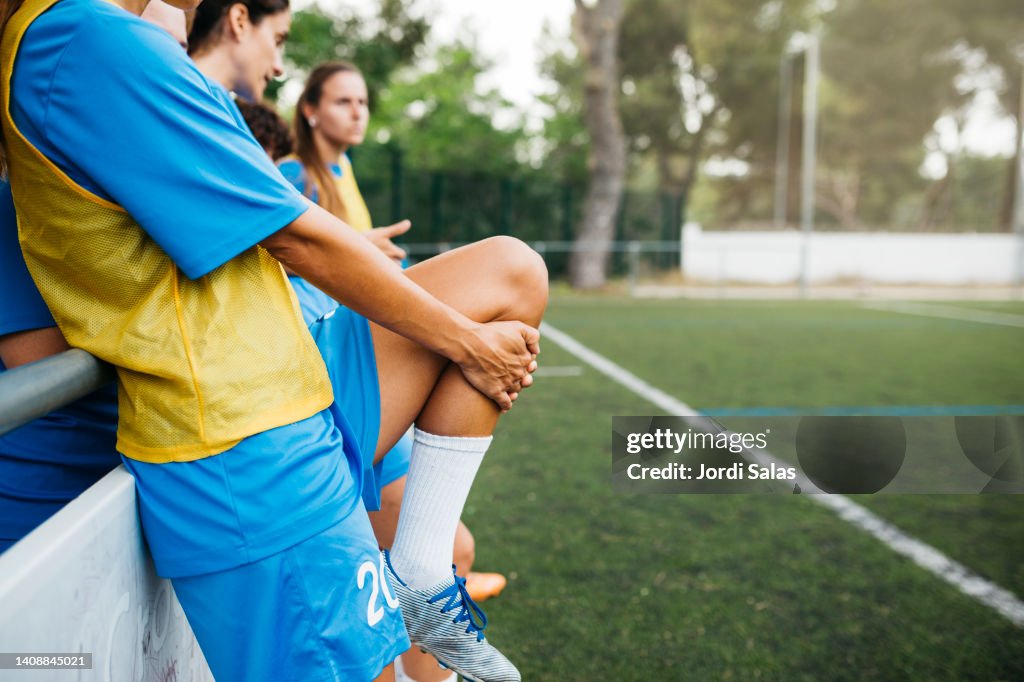 Female soccer team warming up