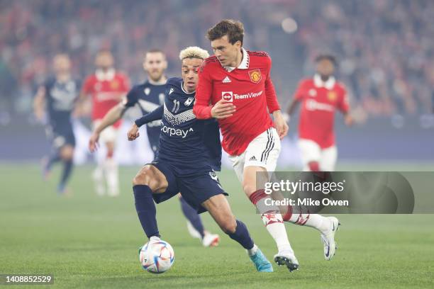 Victor Lindelof of Manchester United and Ben Folami of the Victory compete for the ball during the Pre-Season friendly match between Melbourne...