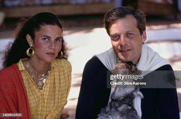 Olimpia de Rothschild and David de Rothschild with his Schnauzer, 'Buster', Marbella, Spain, circa 1975.