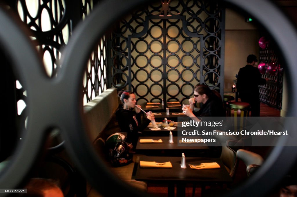 D.13SNEAKYTIKI_252_CG.JPG Sneaky Tiki has taken over the space that once housed Hamburger Mary's. the whimsical space been designed by owner Craige Walters. Please get several shots of the interior: perhaps the six bubble fish tanks on the wall at the